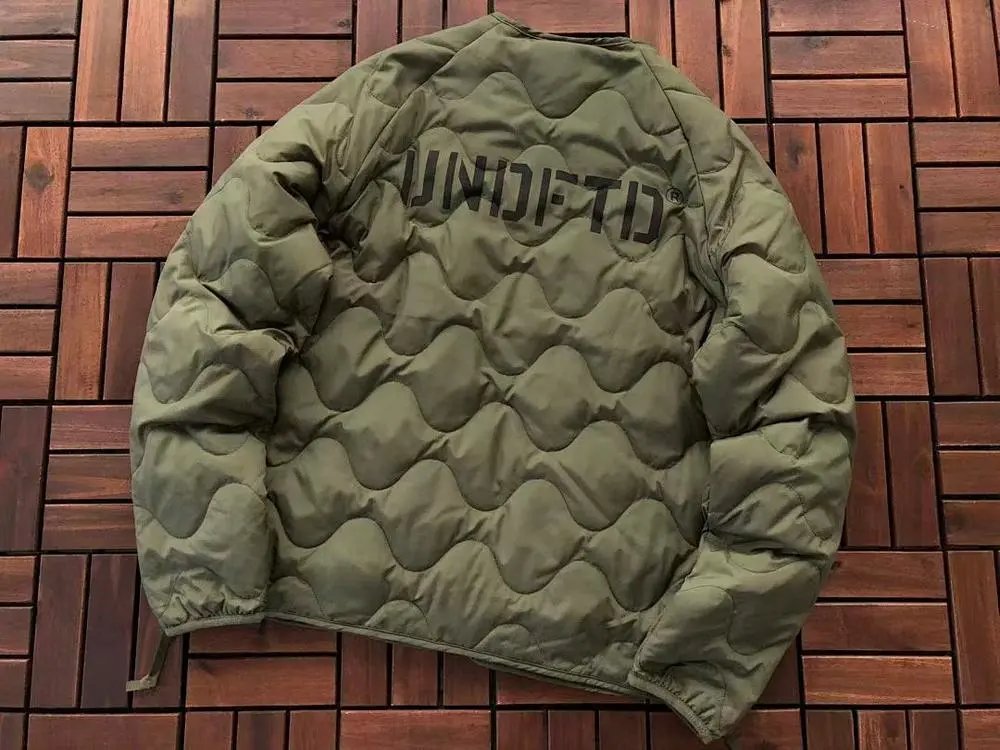 Undefeated Down Jackets Wavy-quilted logo puffer jacket image 5