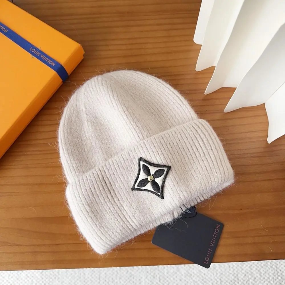 Louis Vuitton Hats Rib-knit cuffed beanie with floral emblem patch — Style 10