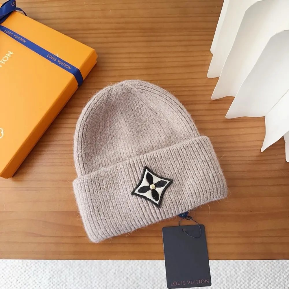 Louis Vuitton Hats Rib-knit cuffed beanie with floral emblem patch — Style 3