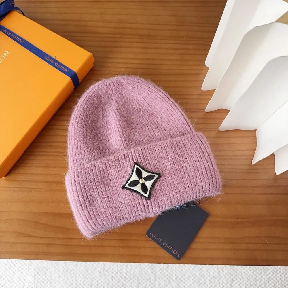 Louis Vuitton Hats Rib-knit cuffed beanie with floral emblem patch — Style 2