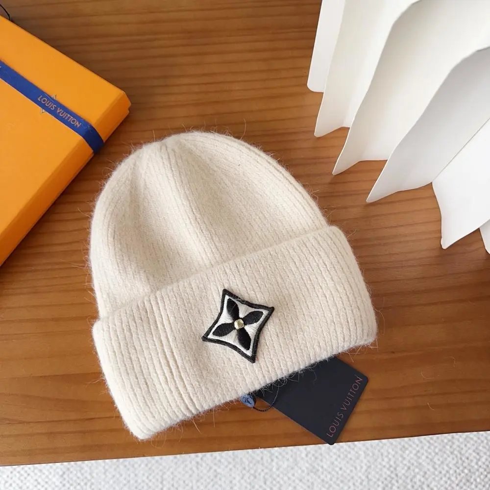 Louis Vuitton Hats Rib-knit cuffed beanie with floral emblem patch — Style 12