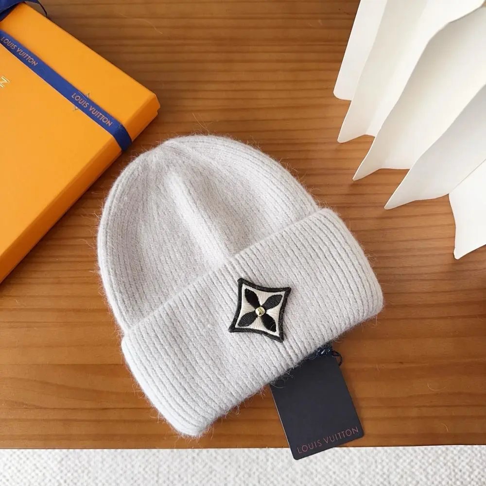 Louis Vuitton Hats Rib-knit cuffed beanie with floral emblem patch — Style 11