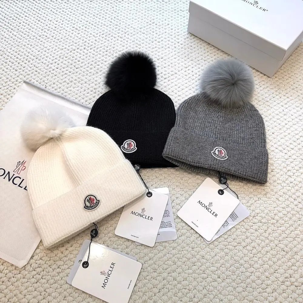 Moncler Hats Logo-patch rib-knit beanie with pom-pom and cable-knit variants image 4