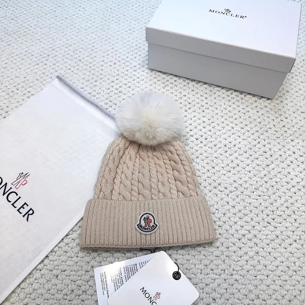 Moncler Hats Logo-patch rib-knit beanie with pom-pom and cable-knit variants — Style 10