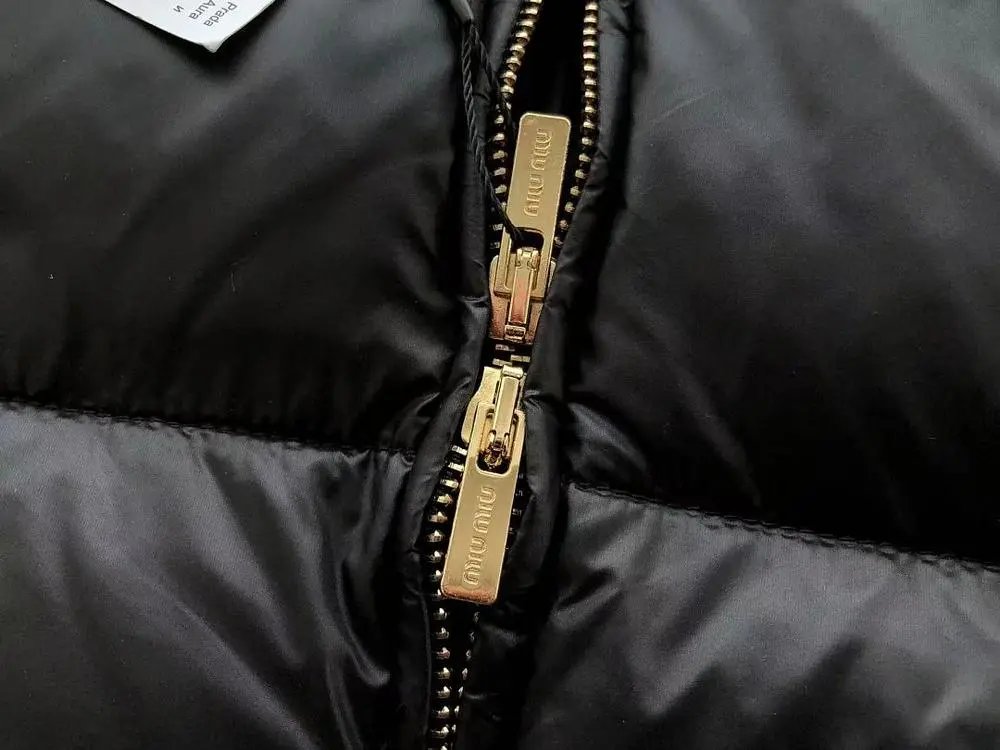 Miu Down Jackets Cropped high-neck puffer jacket image 6