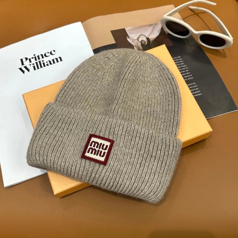 Miu Hats Rib-knit cuffed beanie with logo patch image 6