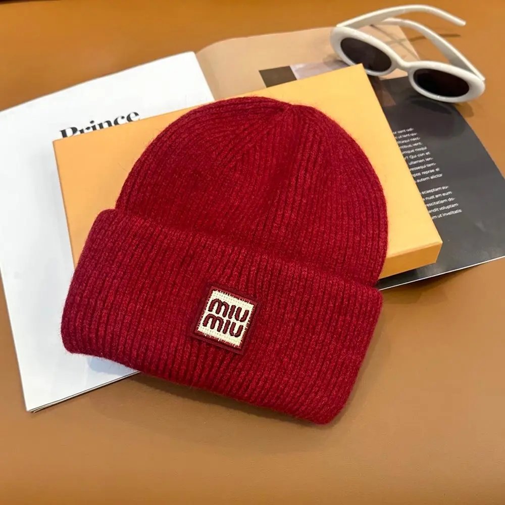 Miu Hats Rib-knit cuffed beanie with logo patch — Style 8