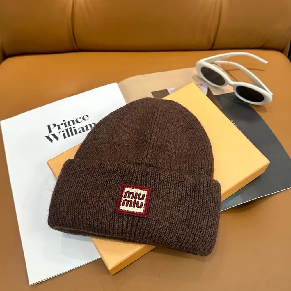 Miu Hats Rib-knit cuffed beanie with logo patch — Style 7