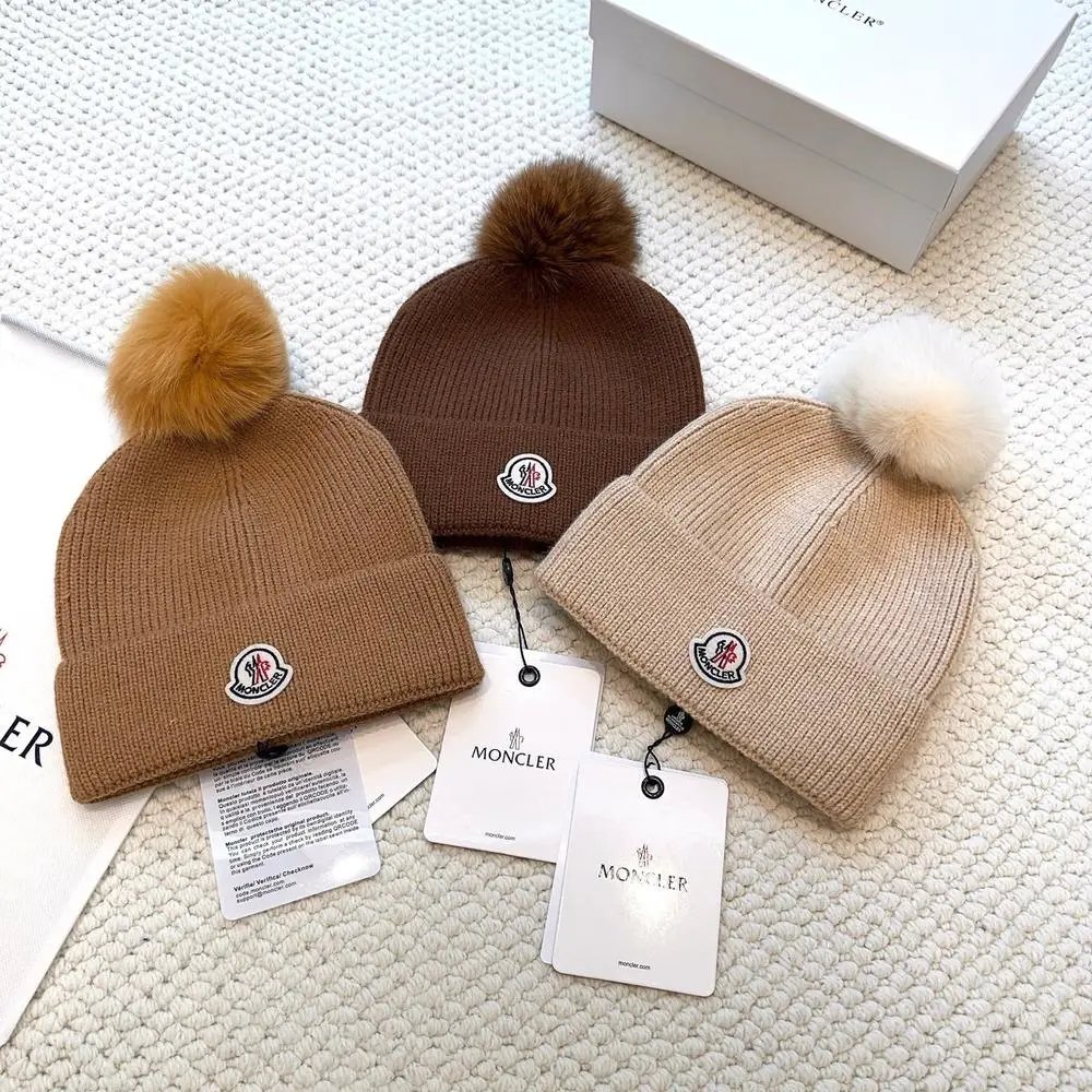 Moncler Hats Logo-patch rib-knit beanie with pom-pom and cable-knit variants image 5