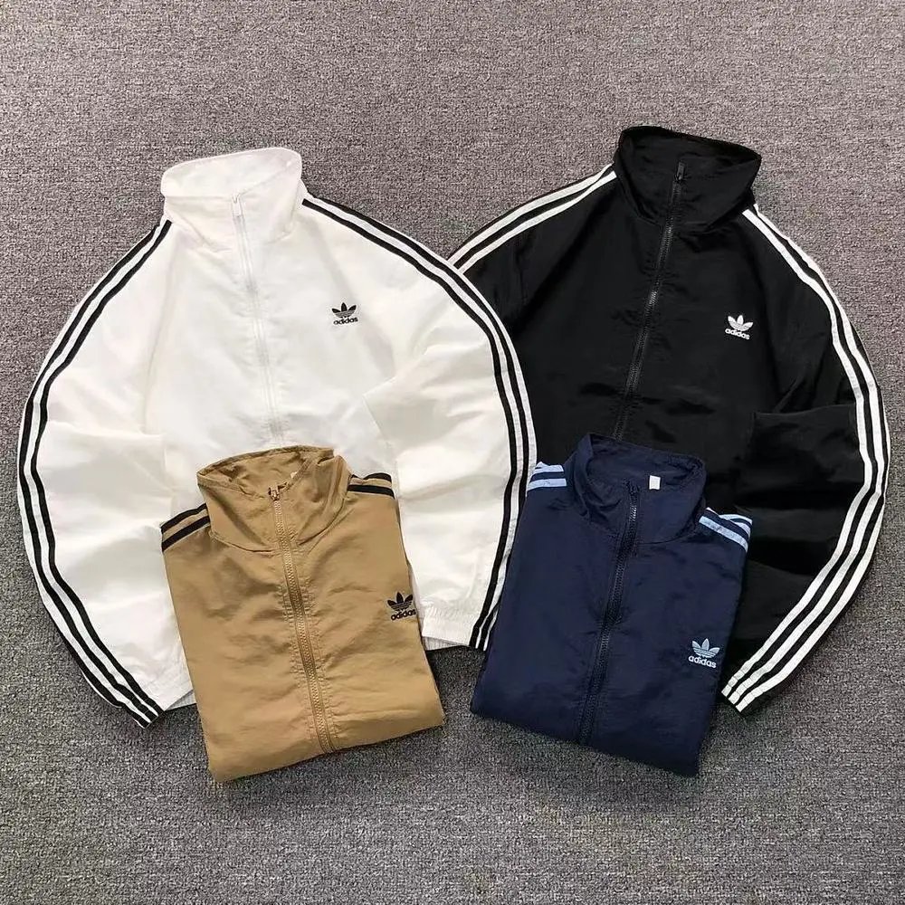 Adidas Originals three stripes windbreaker jacket — W2CFinds curated find