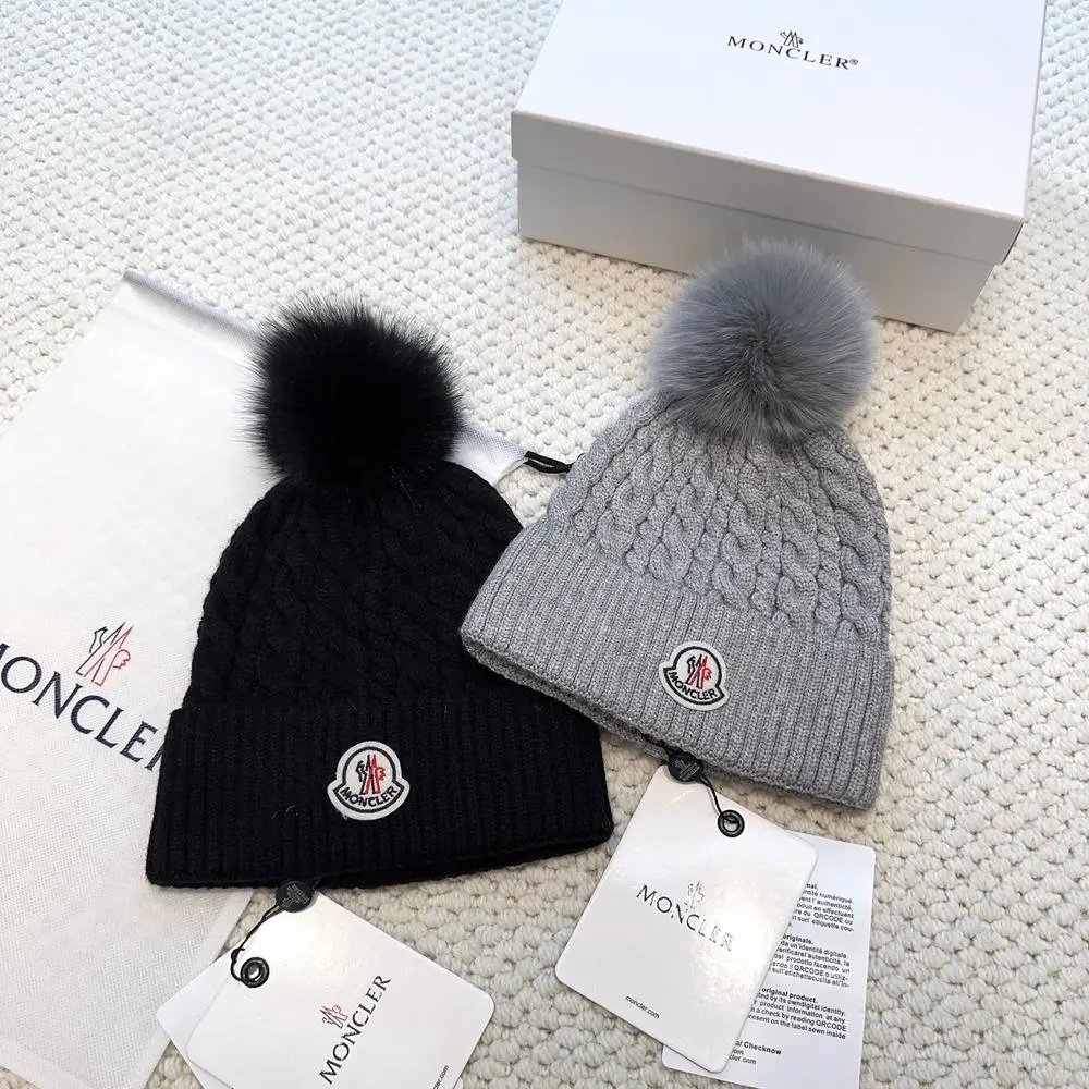 Moncler Hats Logo-patch rib-knit beanie with pom-pom and cable-knit variants image 6