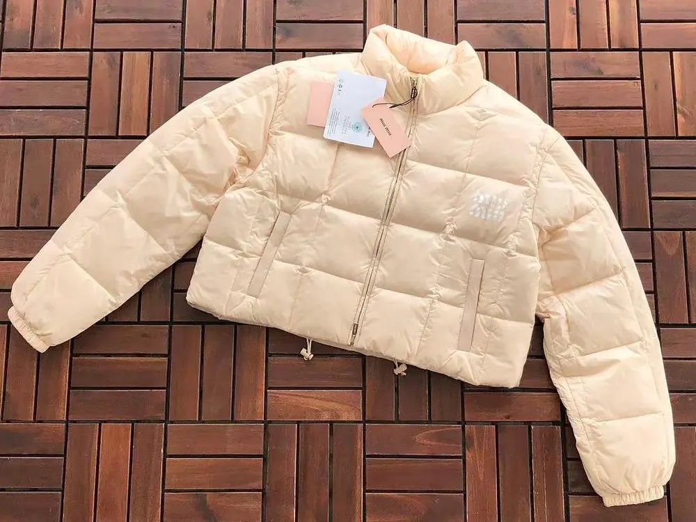 Miu Down Jackets Cropped high-neck puffer jacket image 3