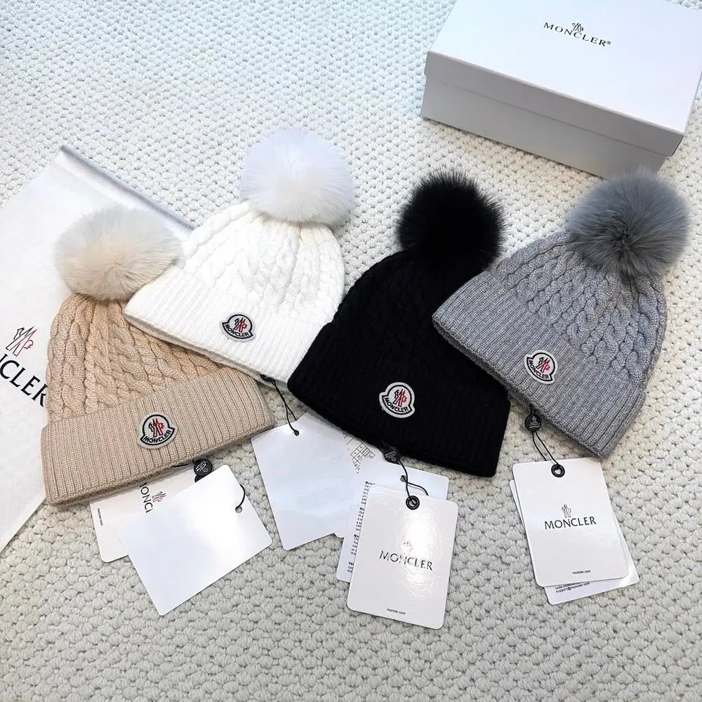 Moncler Hats Logo-patch rib-knit beanie with pom-pom and cable-knit variants image 2