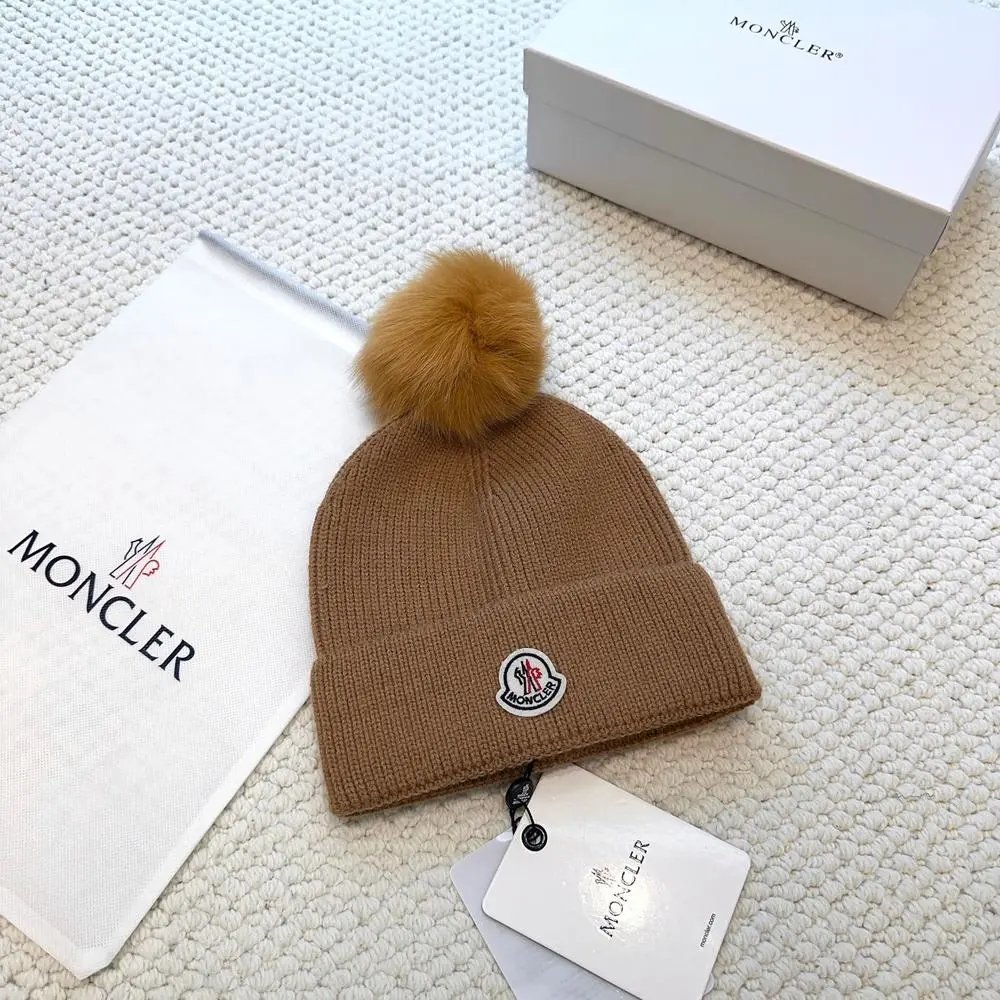 Moncler Hats Logo-patch rib-knit beanie with pom-pom and cable-knit variants — Style 8