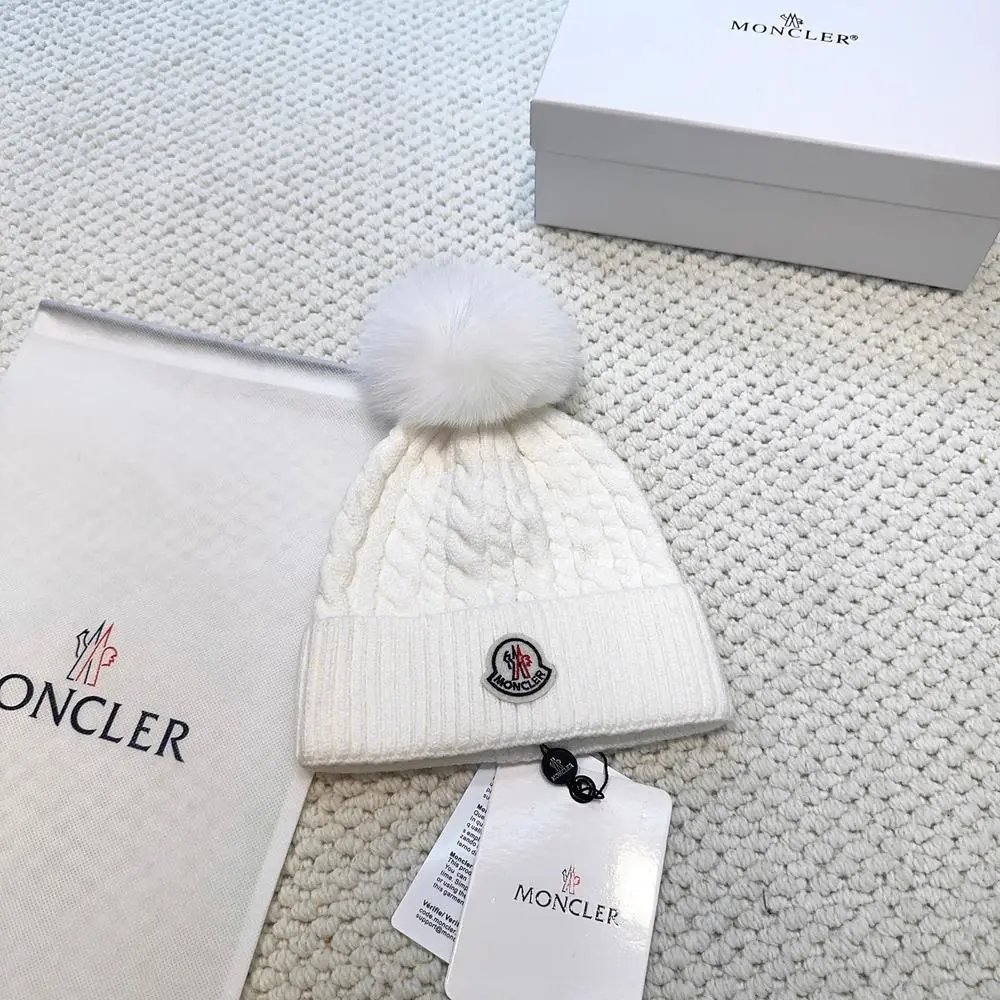 Moncler Hats Logo-patch rib-knit beanie with pom-pom and cable-knit variants — Style 14