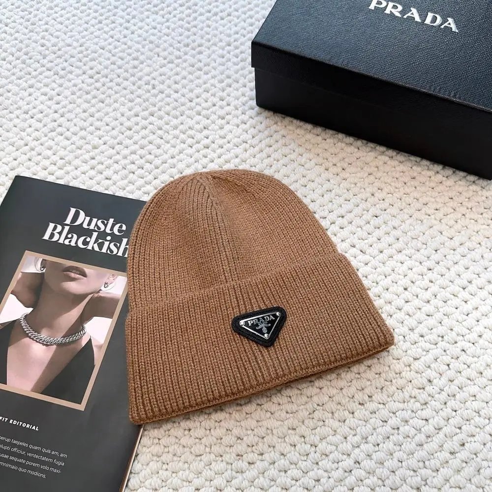 Prada Hats Ribbed knit beanie with triangular logo plaque — Style 5