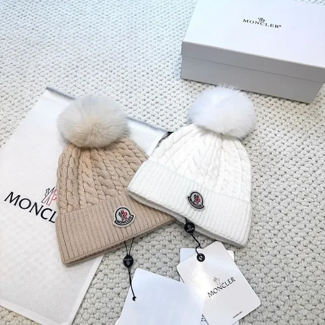 Moncler Hats Logo-patch rib-knit beanie with pom-pom and cable-knit variants product detail image 7
