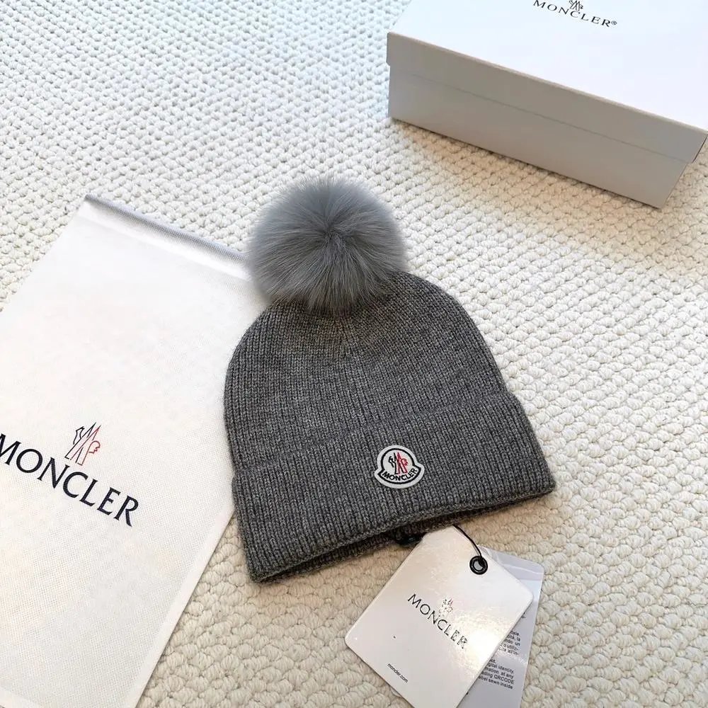 Moncler Hats Logo-patch rib-knit beanie with pom-pom and cable-knit variants — Style 5