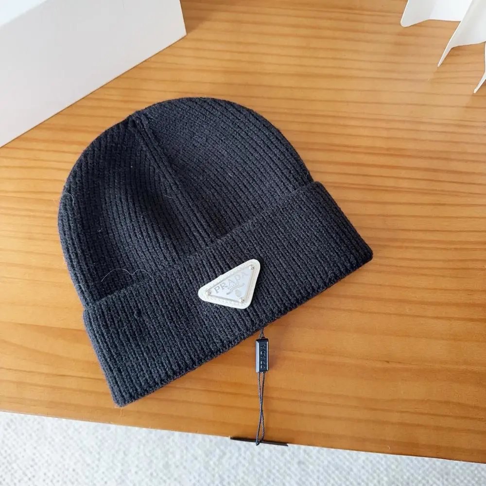 Prada Hats Ribbed knit beanie with triangle logo plaque image 4