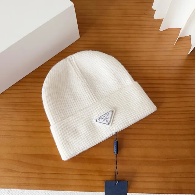 Prada Hats Ribbed knit beanie with triangle logo plaque product detail image 2