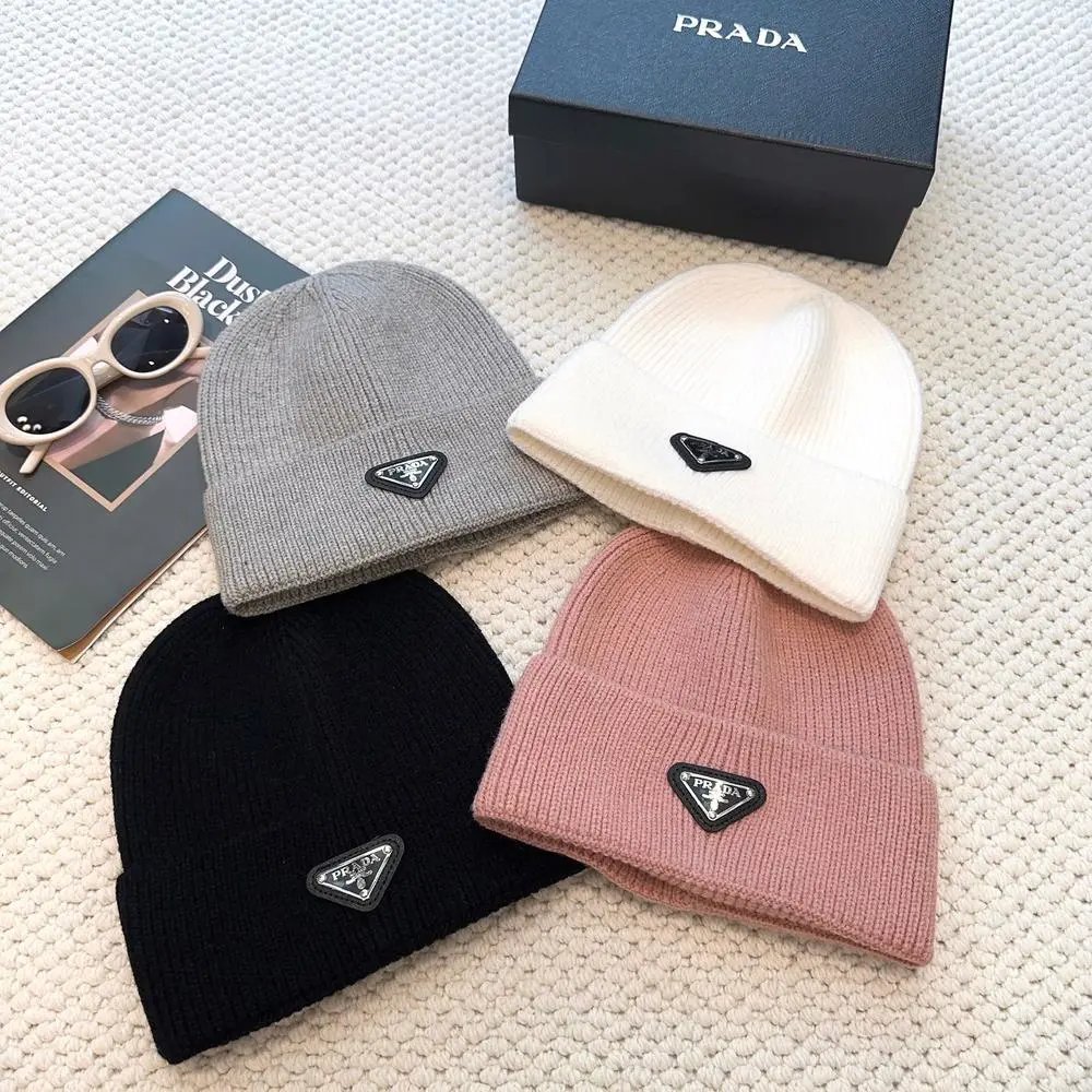 Prada Hats Ribbed knit beanie with triangular logo plaque image 2