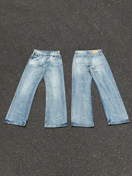 Design Wide-Leg Distressed Light Wash Jeans - 1