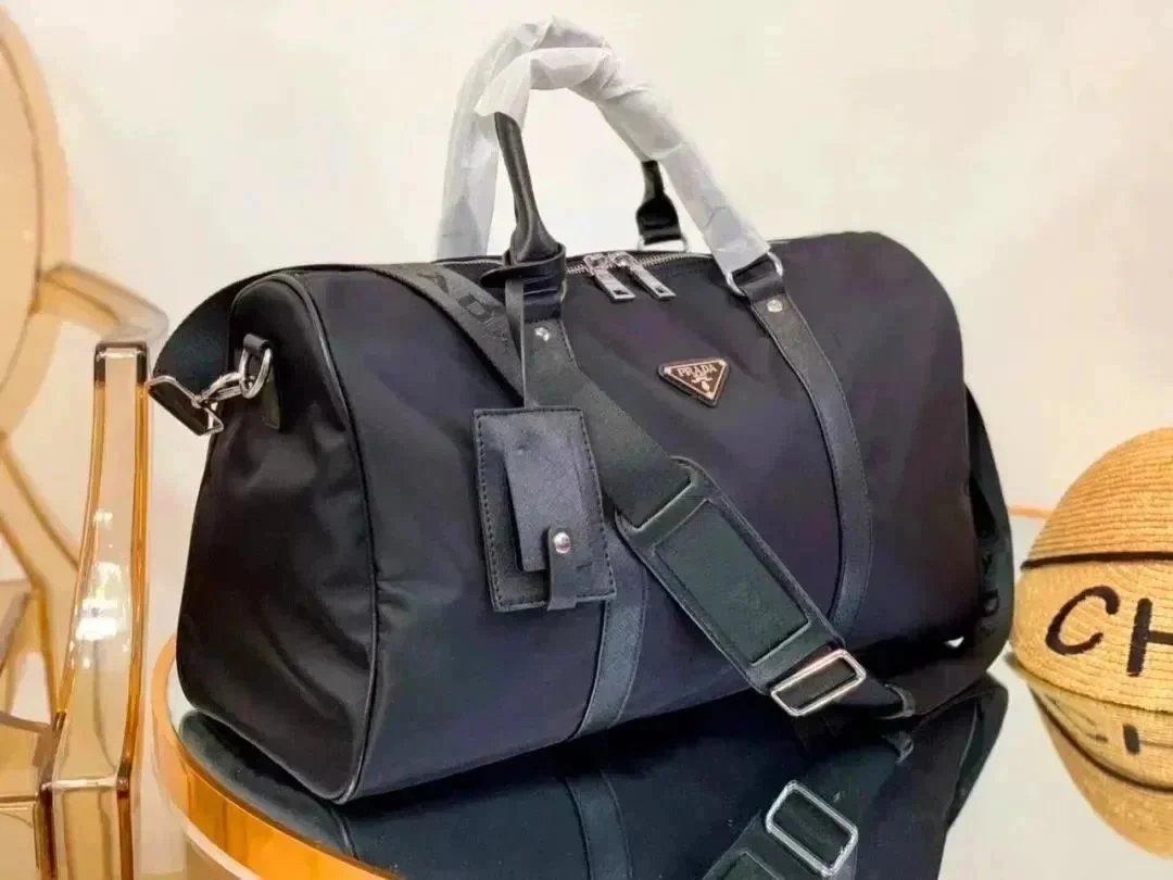1500 2199 Peak Travel Season Essential, Genuine Canvas and Cowhide Leather Travel Bag with Triangular Metal Logo and Dual Zipper Pulls, Calfskin