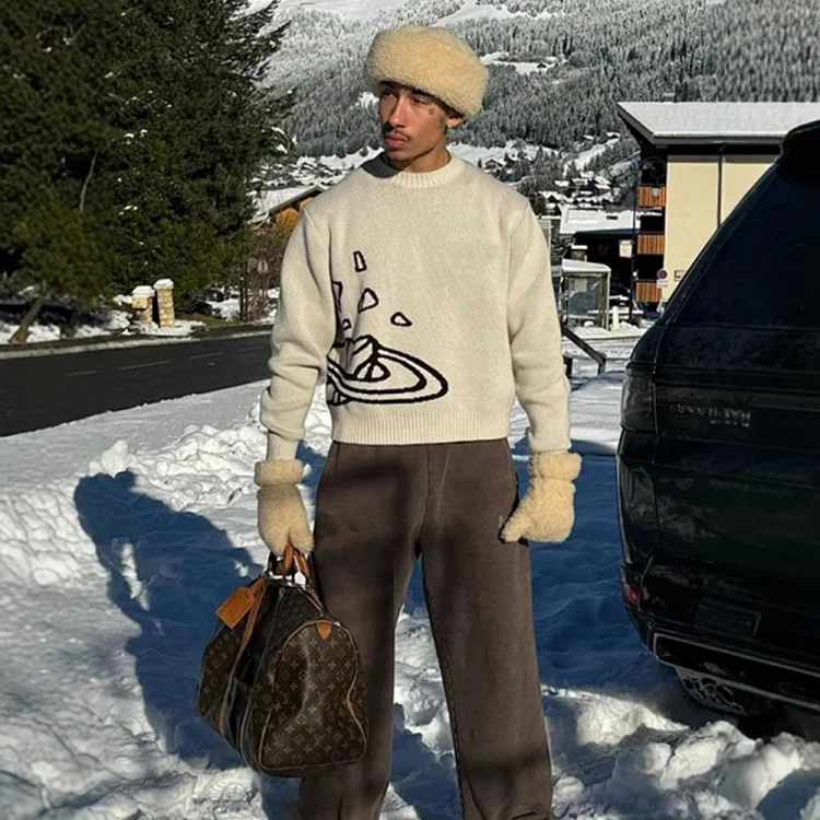 Catalog seller-listing image: Broken-planet letter-pattern knit sweater; not warehouse QC