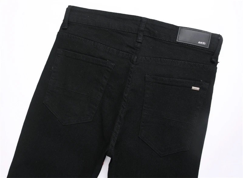 Amiri Black Distressed Patchwork Jeans - 14
