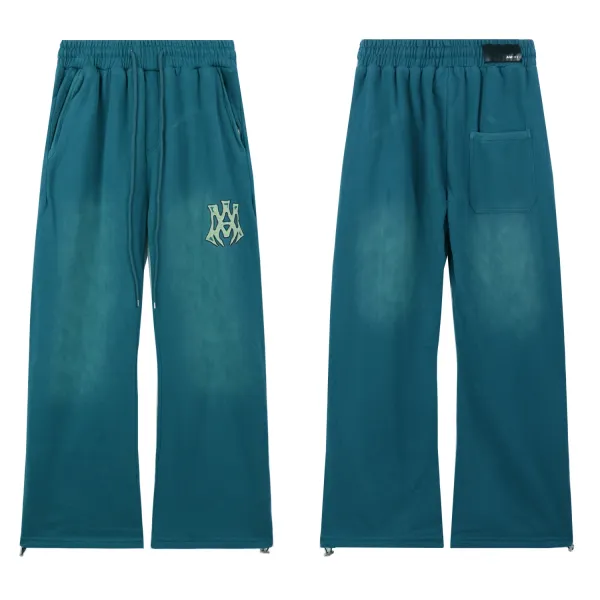 Amiri Logo-Embroidered Teal Washed Sweatpants - 1