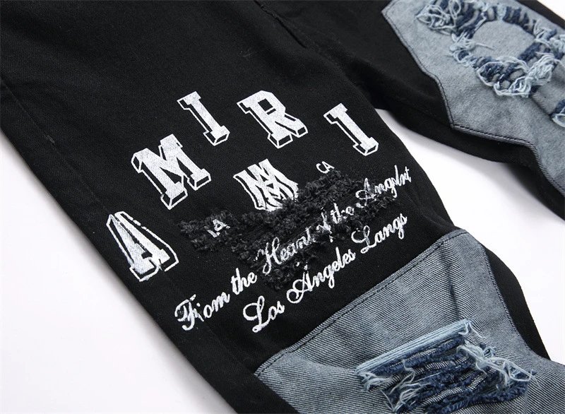 Amiri Black Distressed Patchwork Jeans - 12
