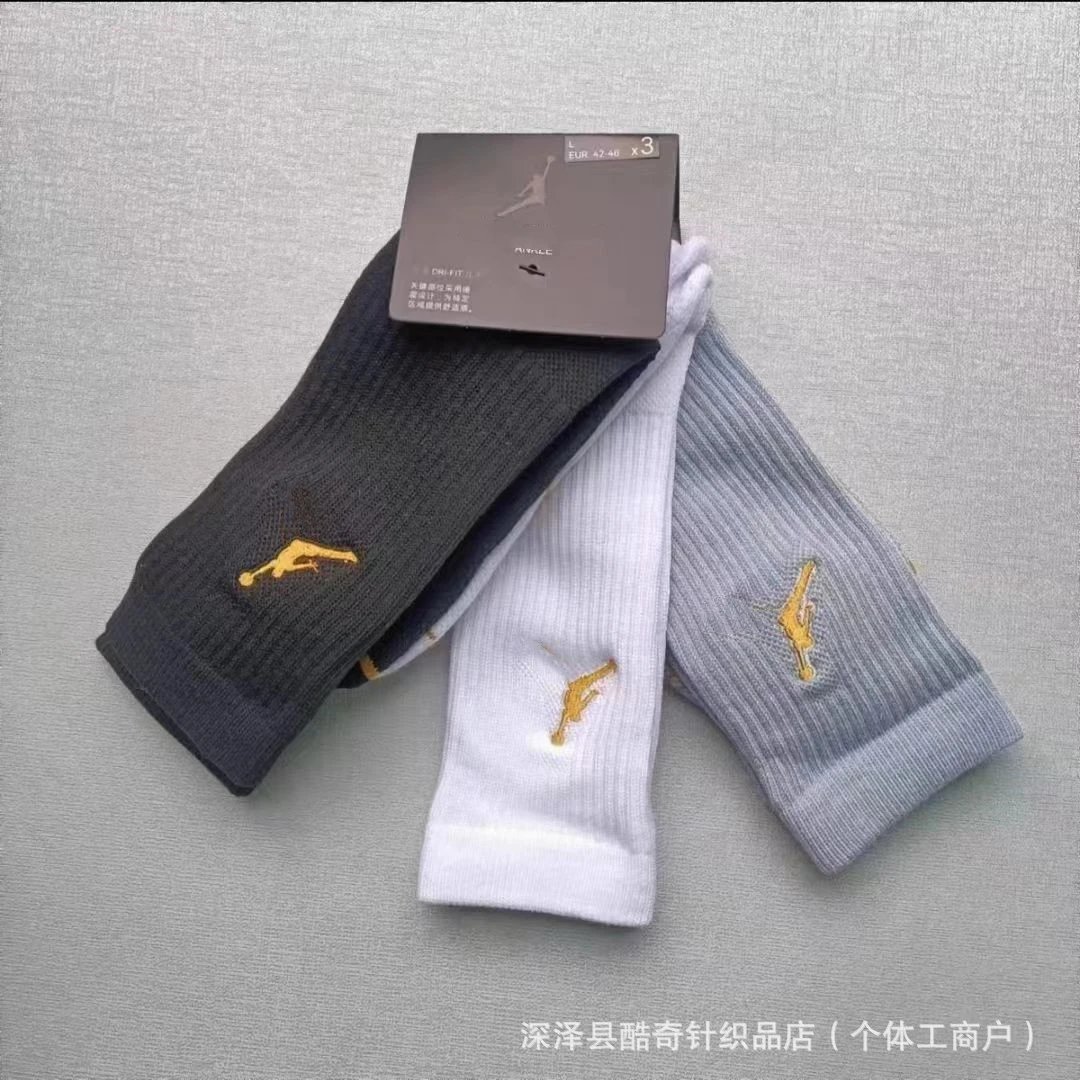 High-top, gold-label black, white, and gray mix-and-match