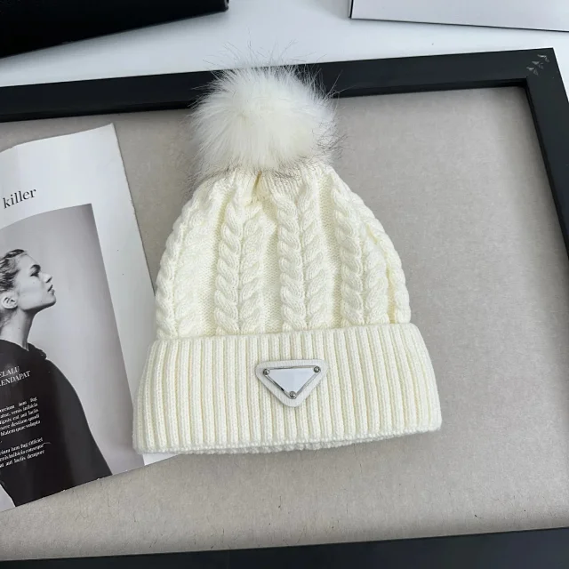 Chanel Hats Cable-Knit Pom-Pom Beanie with Rhinestone Logo product detail image 11