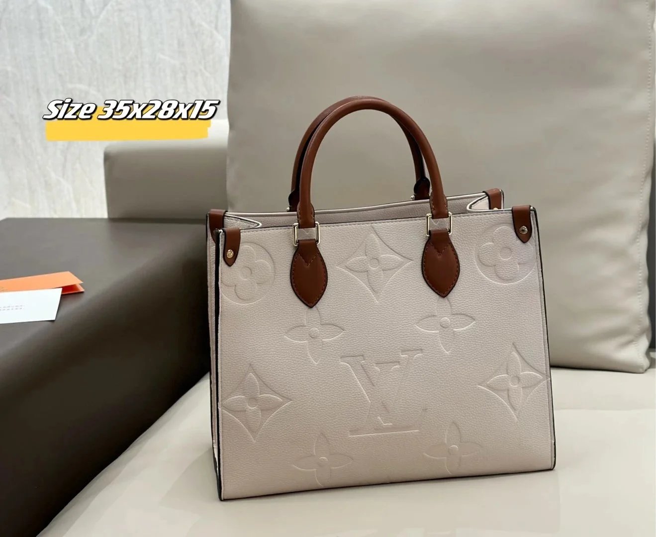 Louis Vuitton Handbags Monogram embossed top-handle satchel with detachable shoulder strap — 22