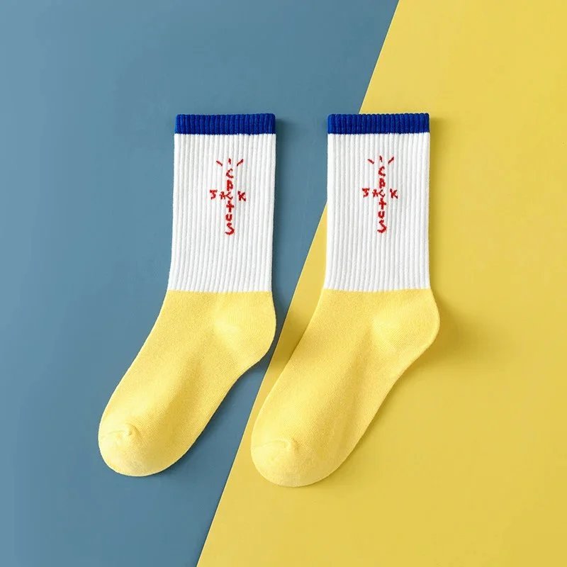 Cactus Jack Socks Ribbed crew with embroidered graphic motifs — New colorway: hook-shaped yellow and blue (letters)