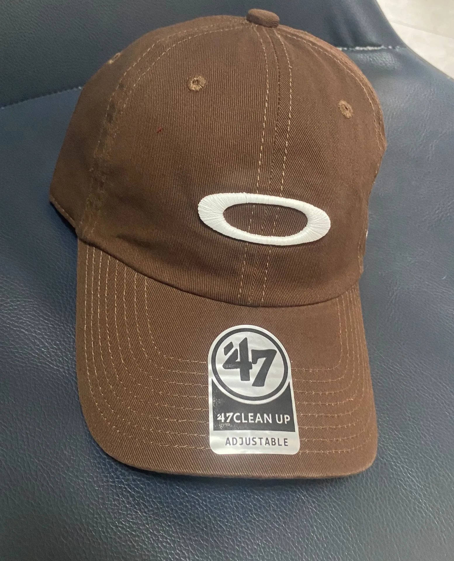 Oakley Hats Baseball Cap with Embroidered Ellipse Logo — Brown white label