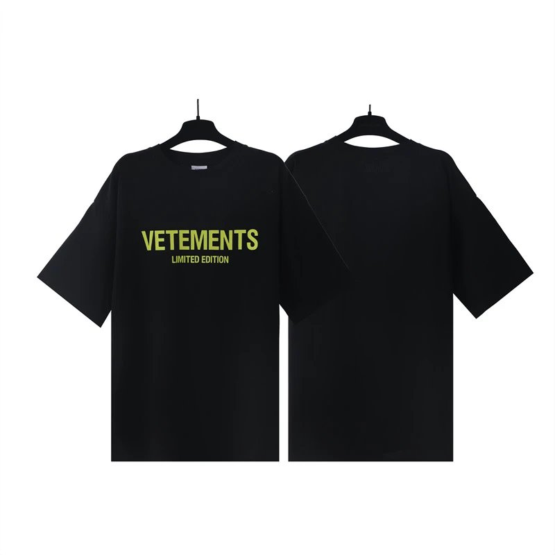 Vetements T-Shirts Washed graphic logo print — Black with yellow lettering 7044