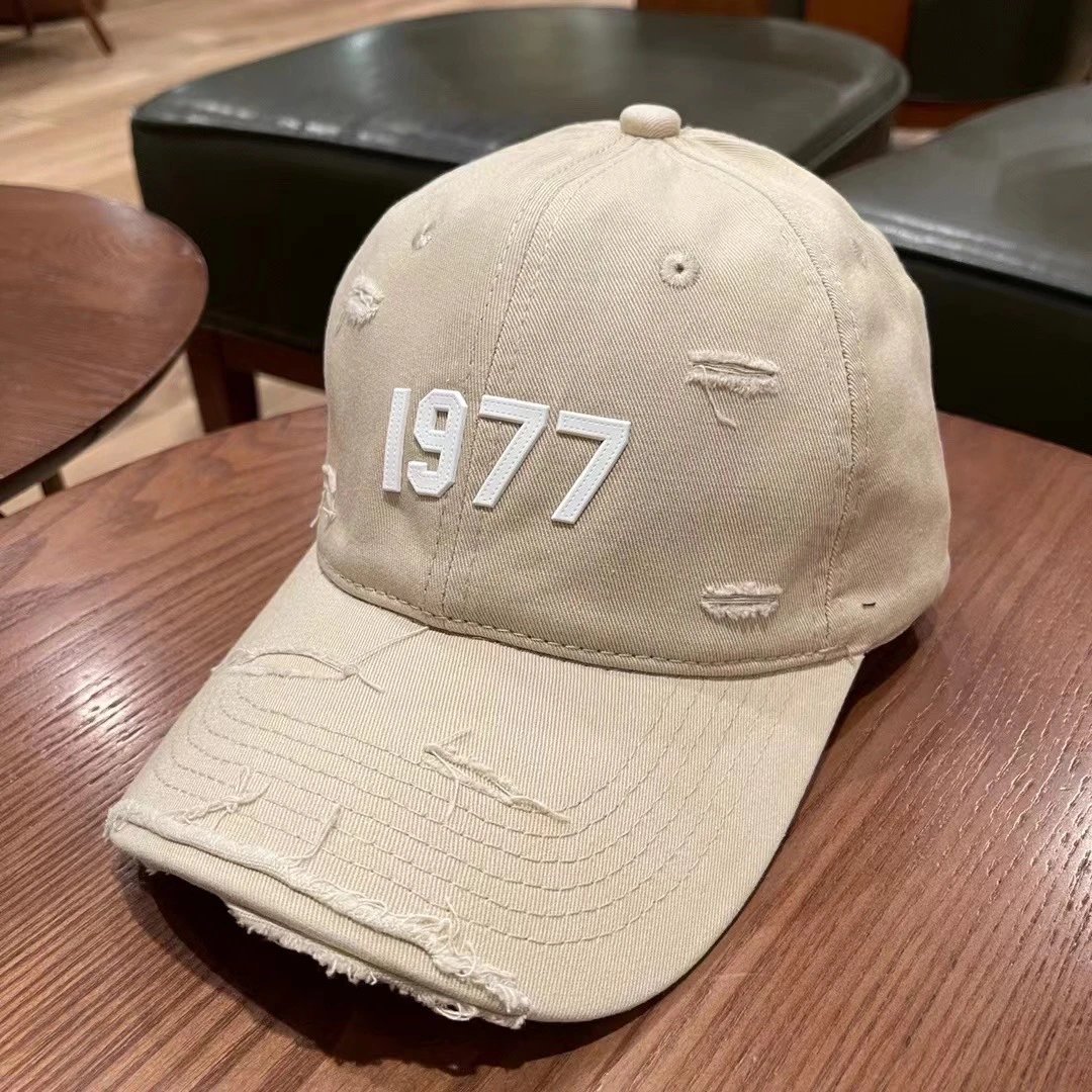 Essentials Hats Distressed Logo Baseball Cap — M06 Khaki