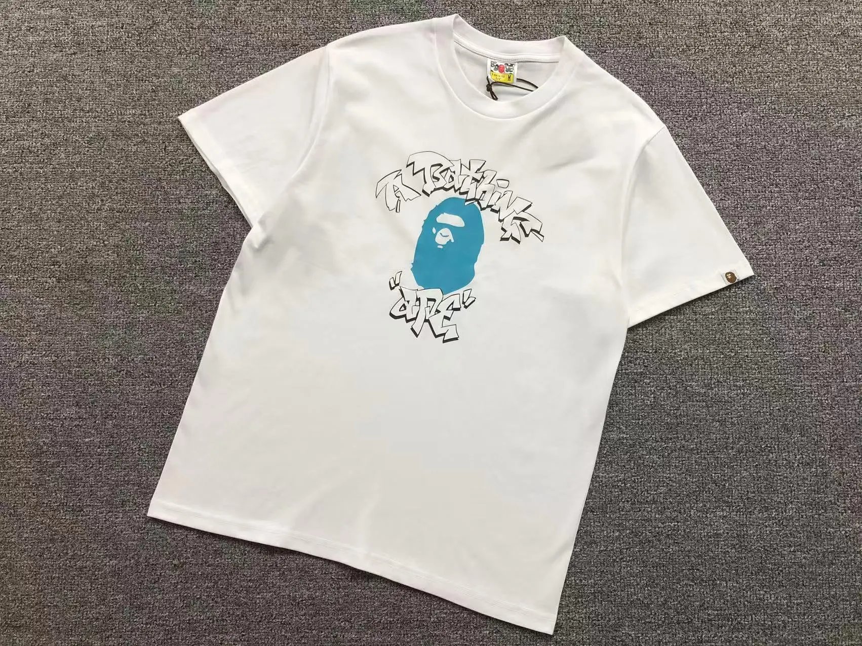 A Bathing Ape T-Shirts Graphic Print — 761 white
