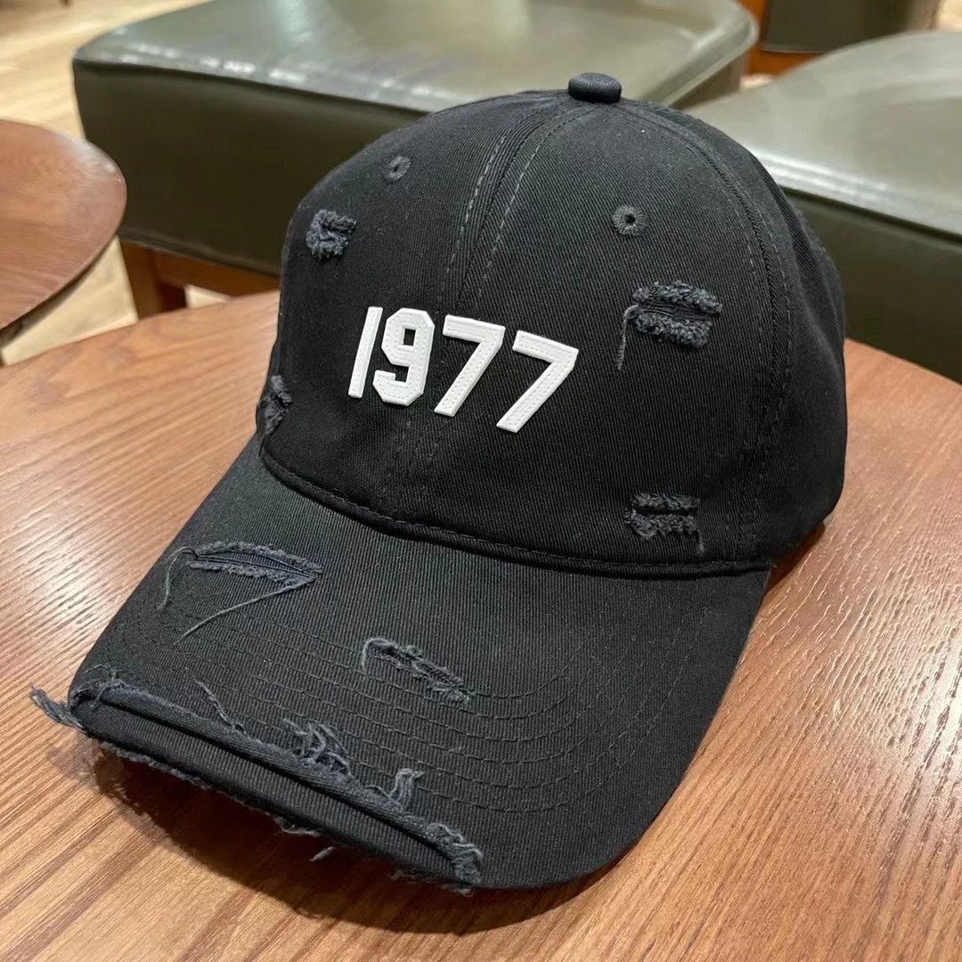 Essentials Hats Distressed Logo Baseball Cap — M06 black