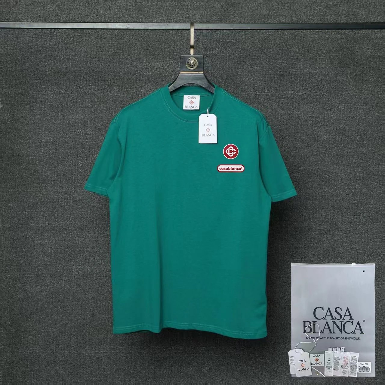 Casablanca T-Shirts Flaming Tennis Ball Graphic — 014 Dark green