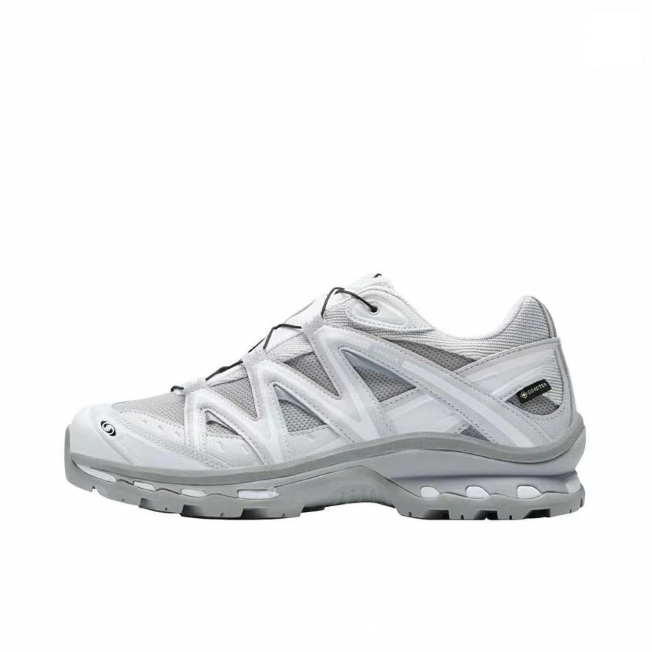 Salomon Multiple trail shoe designs — XTQ White and gray