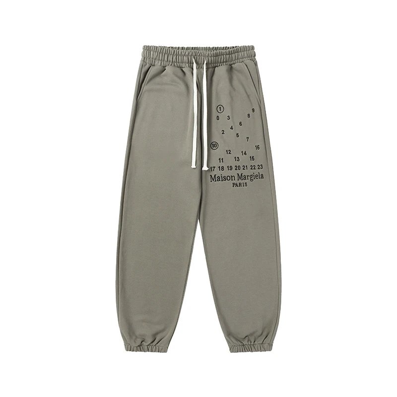 Maison Margiela Trousers Drawstring sweatpants with logo prints — 829