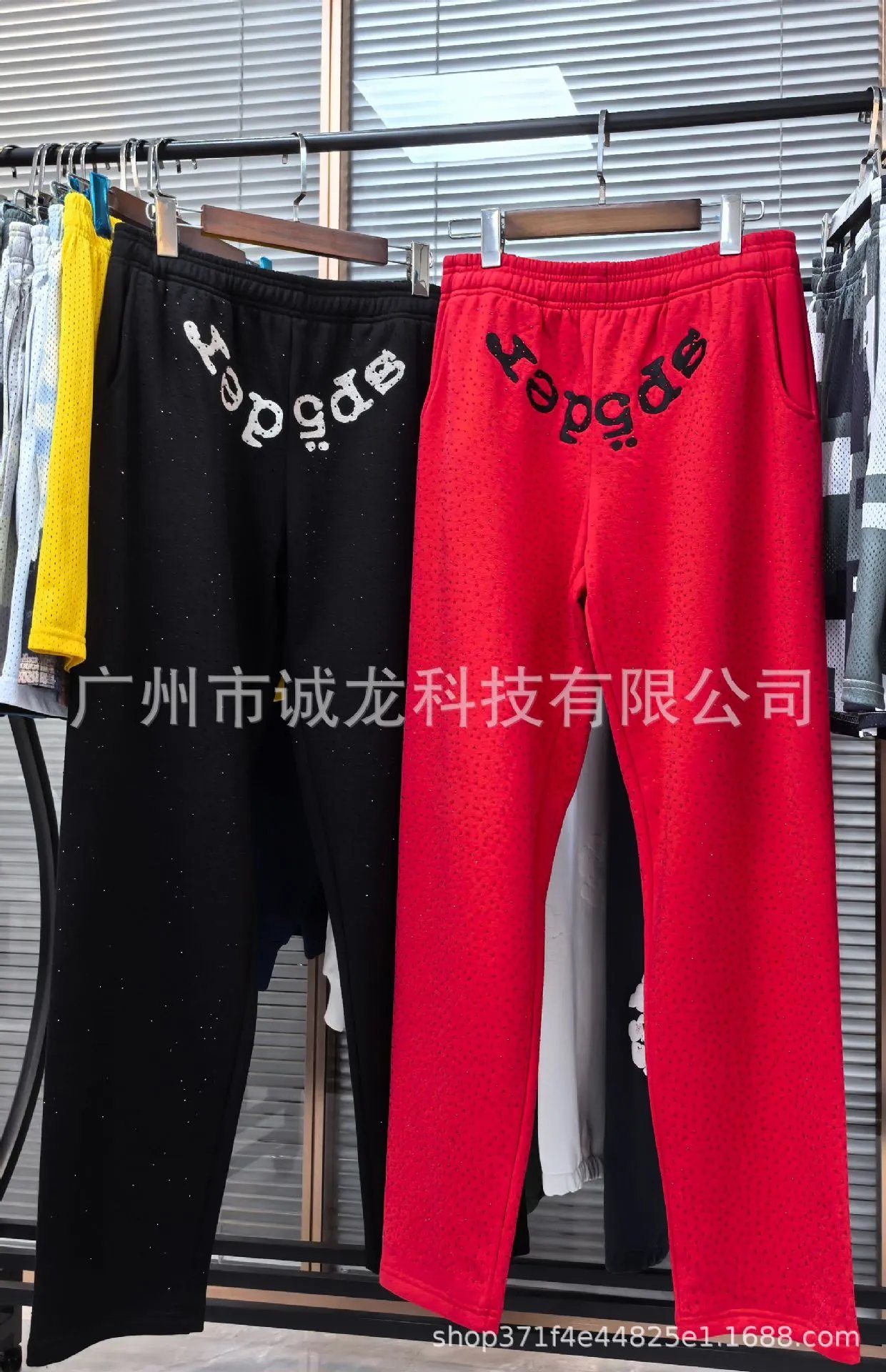 Design Embroidered Logo Perforated Sweatpants Black - 21