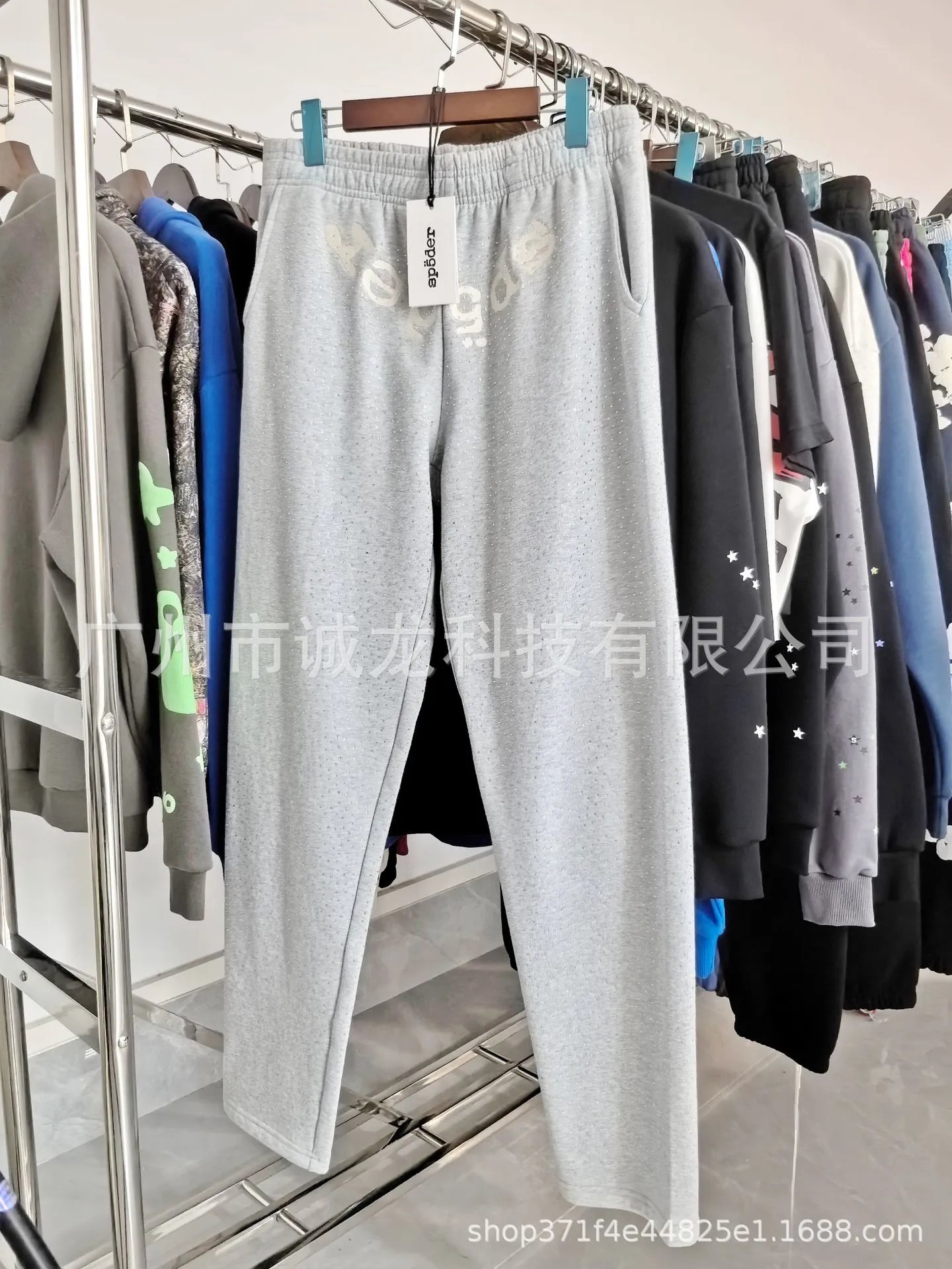 Design Embroidered Logo Perforated Sweatpants Black - 25