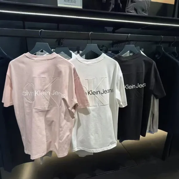 Calvin Klein Jeans Logo Embroidered T-Shirt in Pink, White, and Black - 1