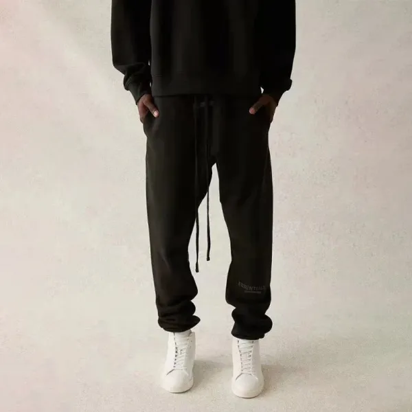 Fear of God Essentials Black Drawstring Sweatpants White Sneakers - 1