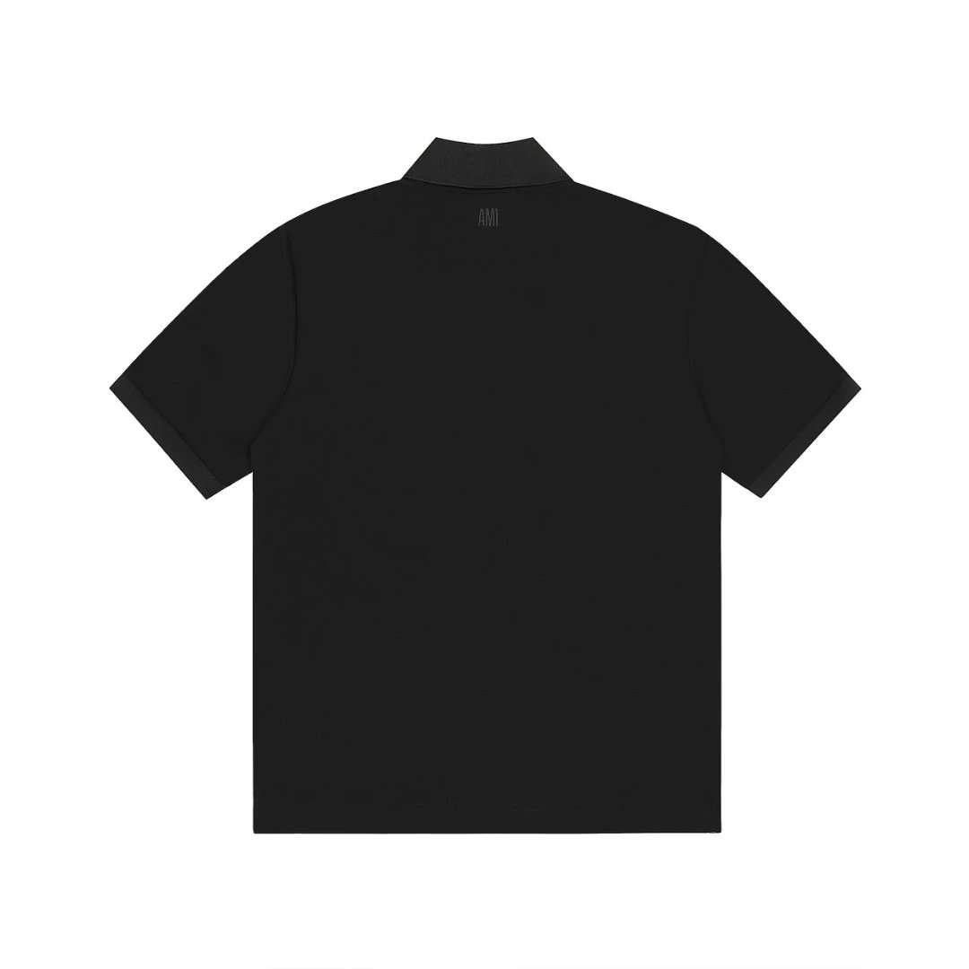AMI Men’s Black Polo Shirt – Classic short-sleeve cotton design with embroidered heart logo, sleek collar, and modern minimalist style for casual or smart outfits.