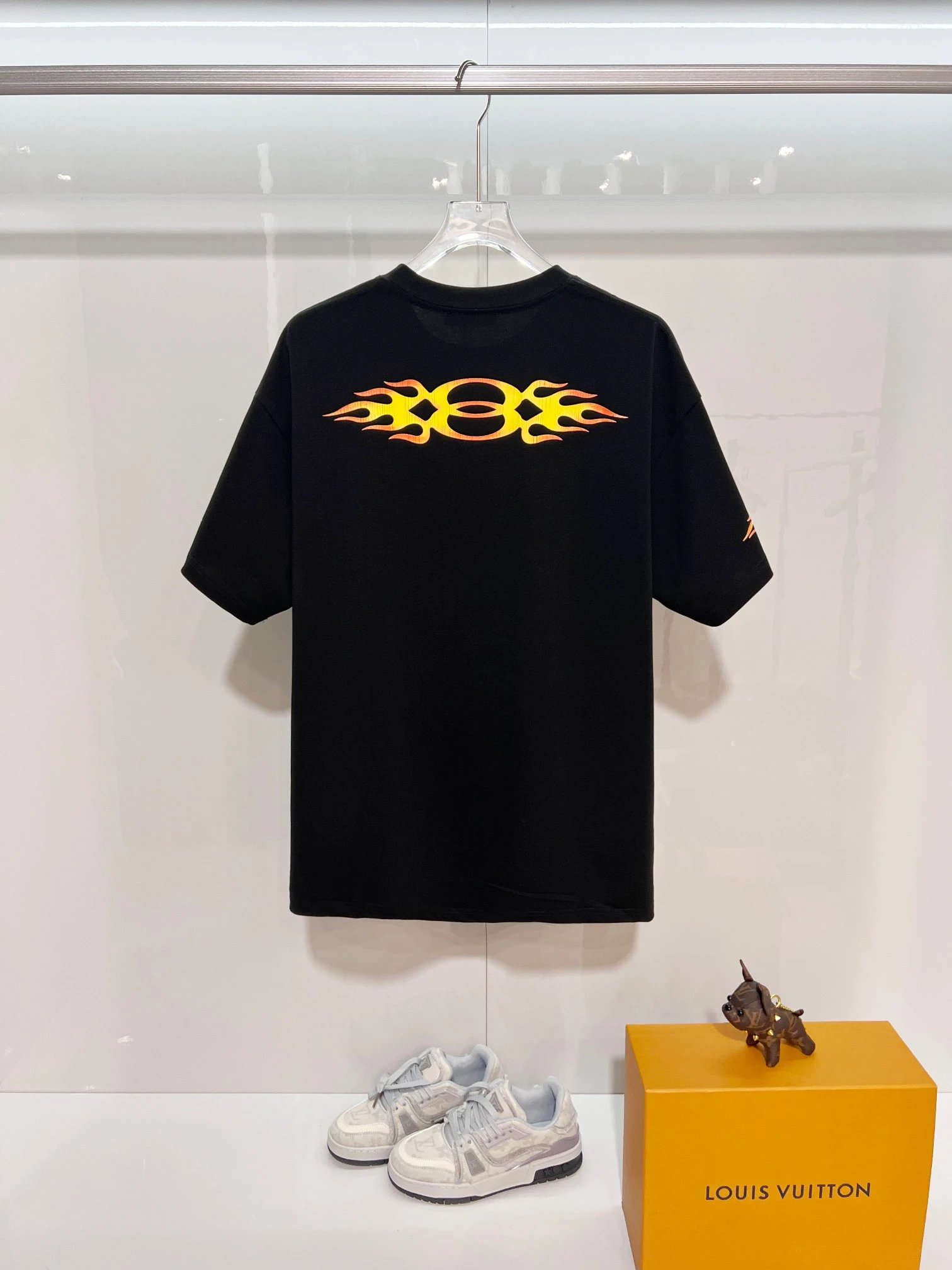 Balenciaga Flame Print Black T-Shirt, stylish designer top featuring bold fire graphic and premium cotton fabric for a modern streetwear look, perfect for casual outfits and fashion lovers.