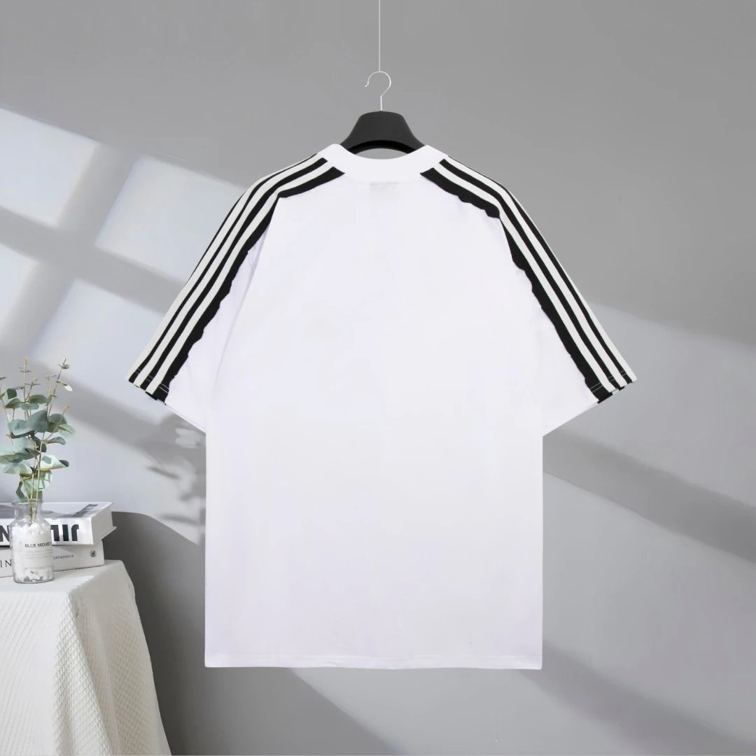 Balenciaga Men’s White T-Shirt, classic logo design with black stripe details, premium cotton, casual fashion top for daily wear and street style.